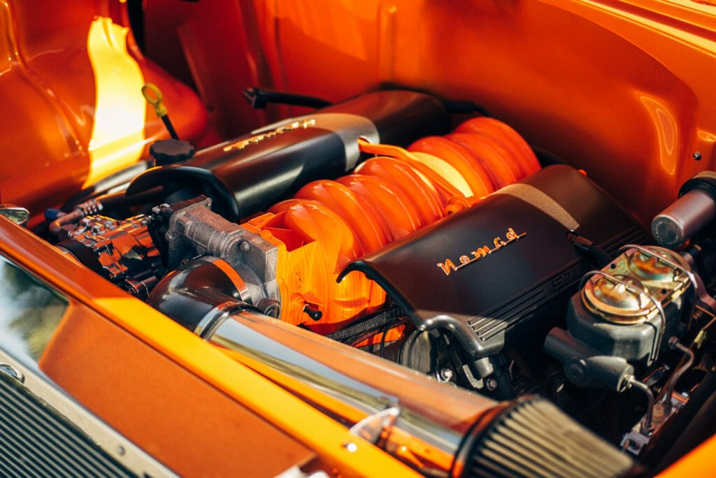 close up of the TurnKey Engine Supply LS1 crate engine inside of Brian Hill of Hill’s Rod and Custom Orange Modified 1955 Chevy Nomad