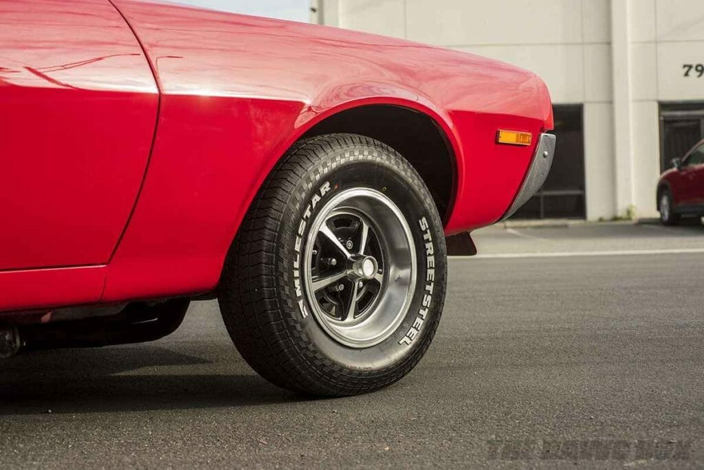 red white and blue ford falcon on classic style milestar tires