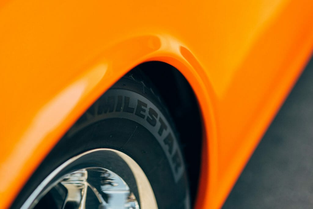 Detial shot the Milestar MS932 Sport tires in 205/50R17 front and 225/60R17 rear of Brian Hill of Hill’s Rod and Custom Orange Modified 1955 Chevy Nomad
