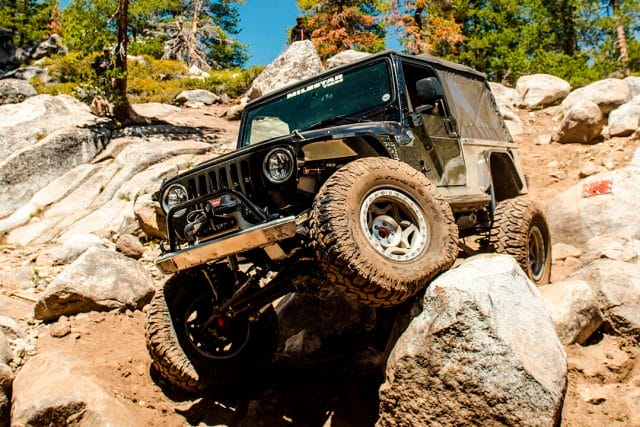 Black Jeep LJ with offroad MT 35s
