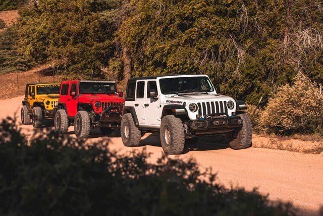 White, red and yellow Jeep JKs with 37, and 38 inch Milestar Patagonia MT tires