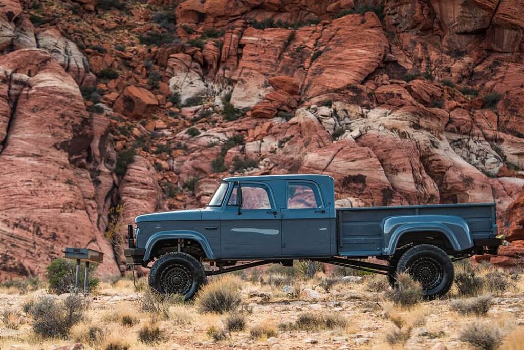 Side shot of an old blue Dodge Crew Cab