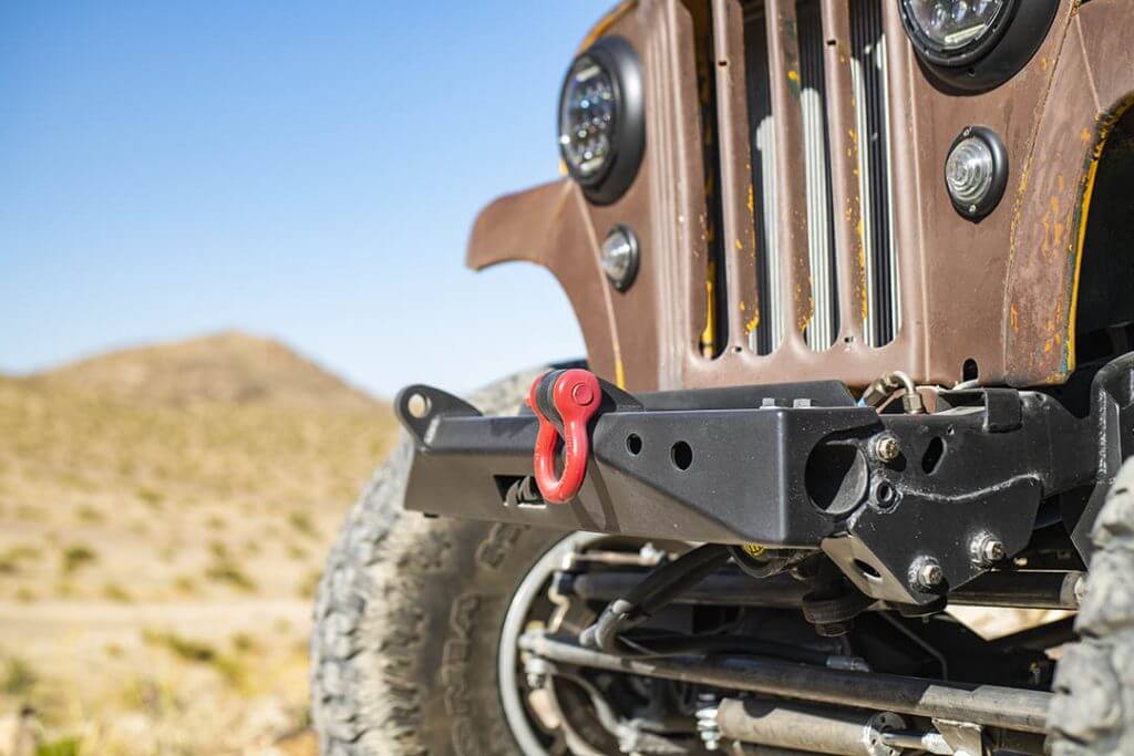 Bumper shot of a brown '56 Willys truck