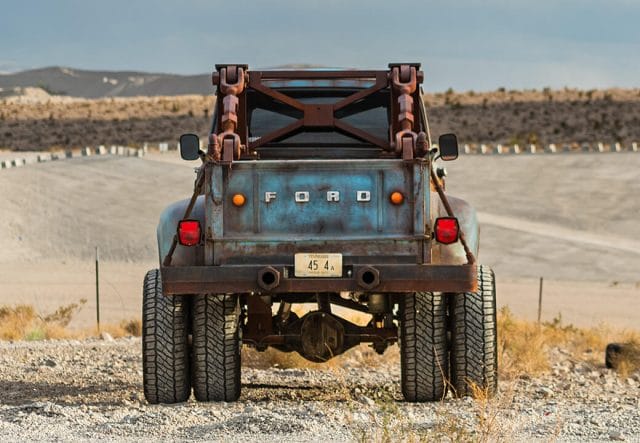 rear of hodson motors ford f600 truck in desert on milestar off-road tires
