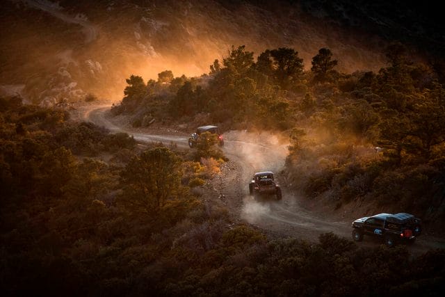 trail of jeeps and overlanding vehicles on milestar patagonia mt