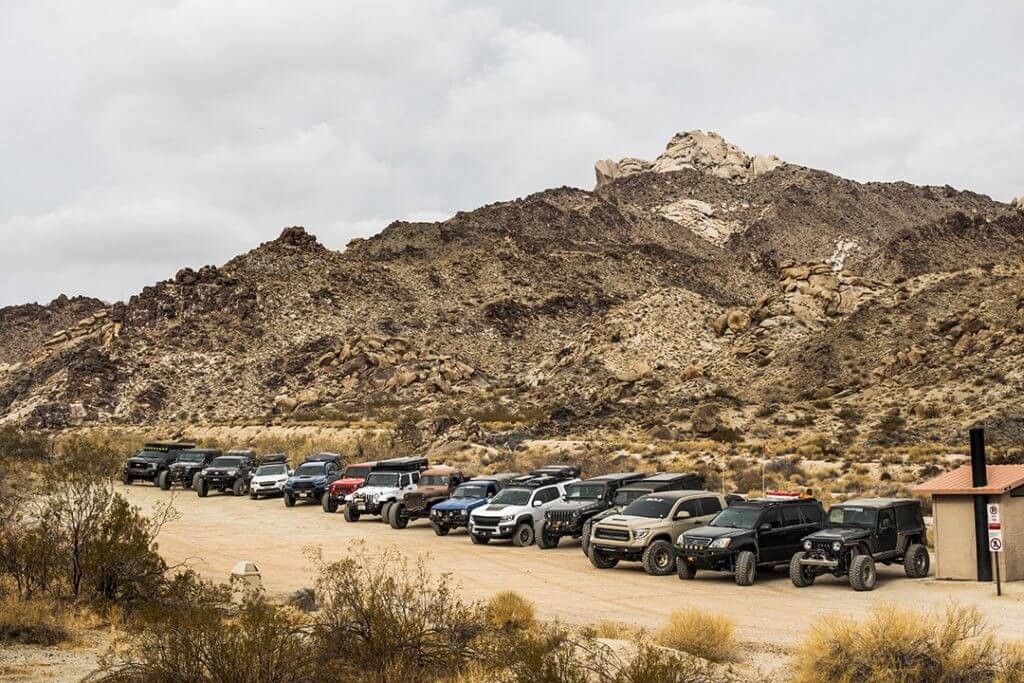 lineup of XPDN 1 milestar rigs ready to overland